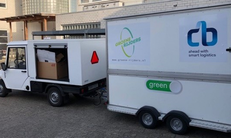 Groene rijders met CB logo header